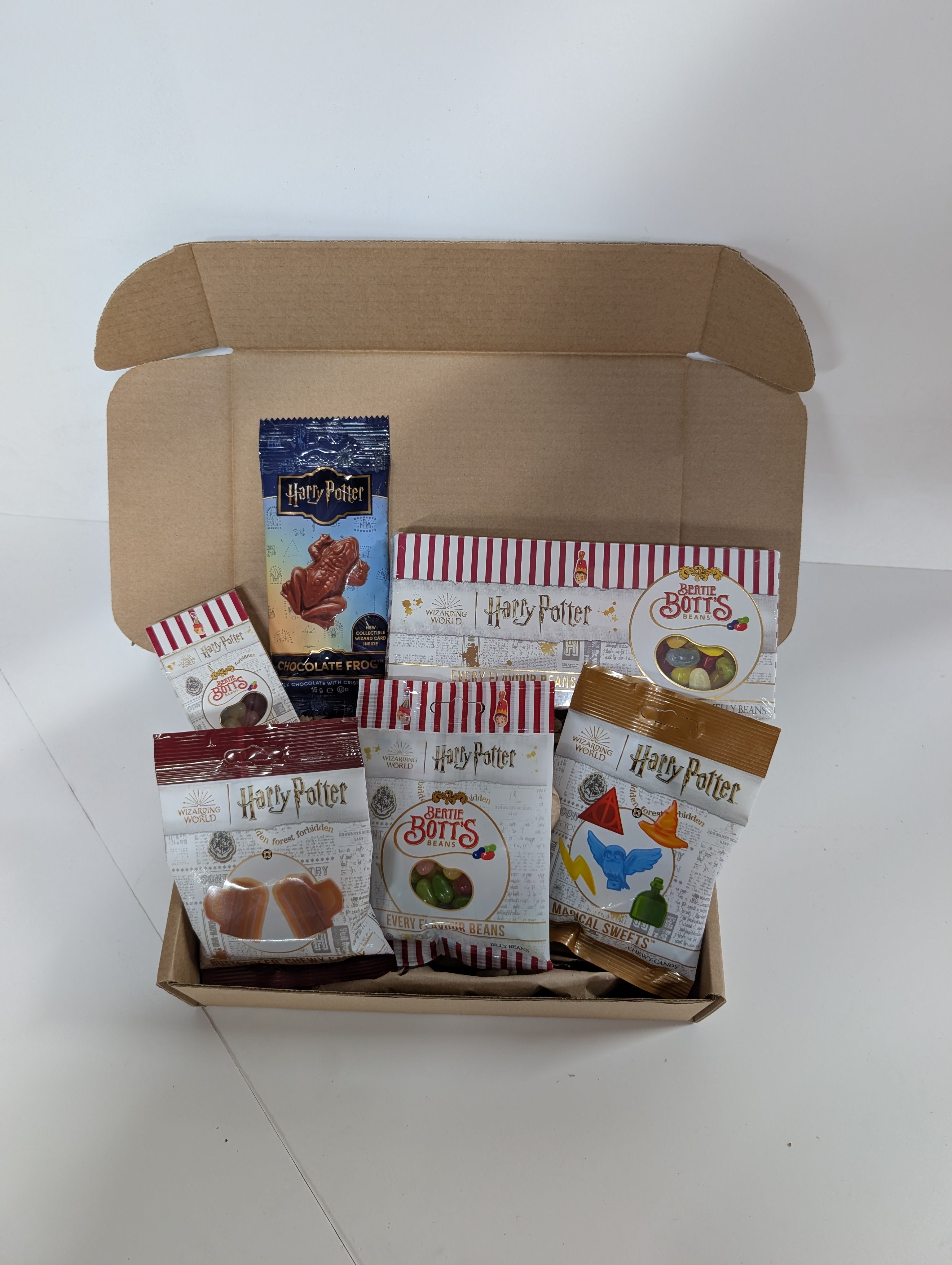 Box of Harry Potter-themed snacks on a white background